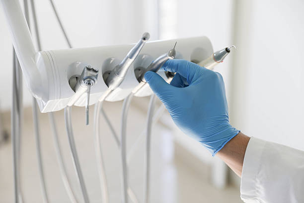Professional Emergency Dentist technician working in Trowbridge Park, MI